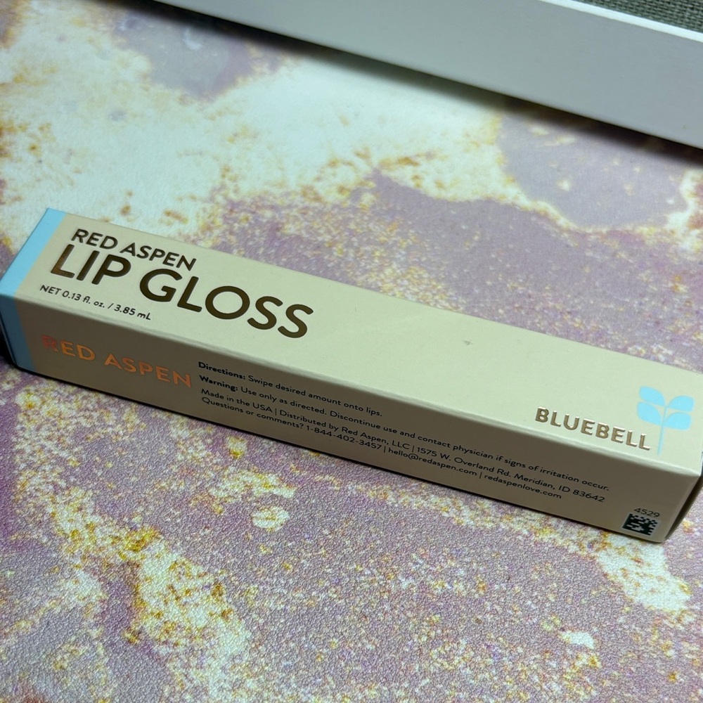 Red Aspen Lip Gloss in Bluebell